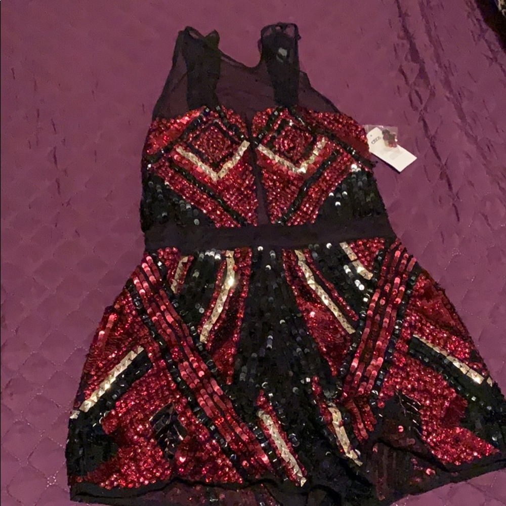 Beautiful romper never worn! W/ tags!